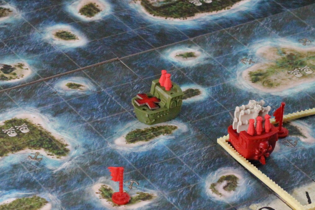 x under ship 2 player board